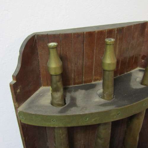 Set of 3 Antique brass fire hose nozzles on wooden display