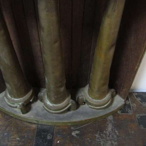Set of 3 Antique brass fire hose nozzles on wooden display