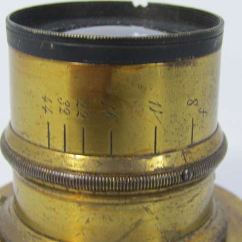Antique F8-44 brass lens