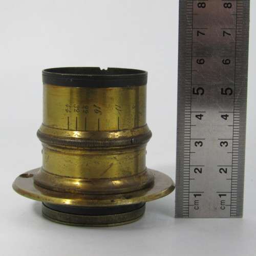 Antique F8-44 brass lens