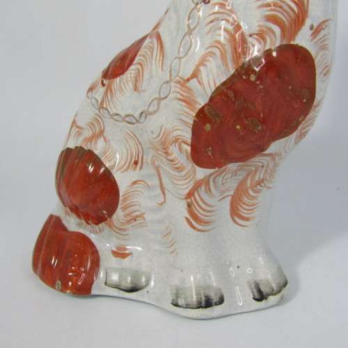 Pair of Staffordshire Spaniels porcelain figurines - some damage