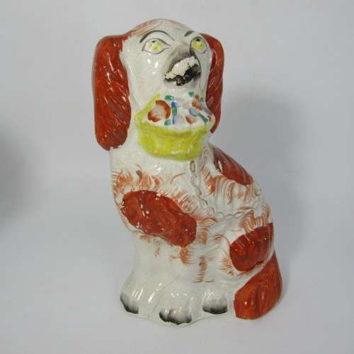 Pair of Staffordshire Spaniels porcelain figurines - some damage