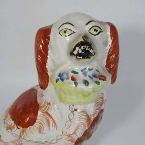 Pair of Staffordshire Spaniels porcelain figurines - some damage