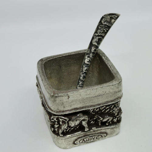 Pair of Andy C salt holders with spoons