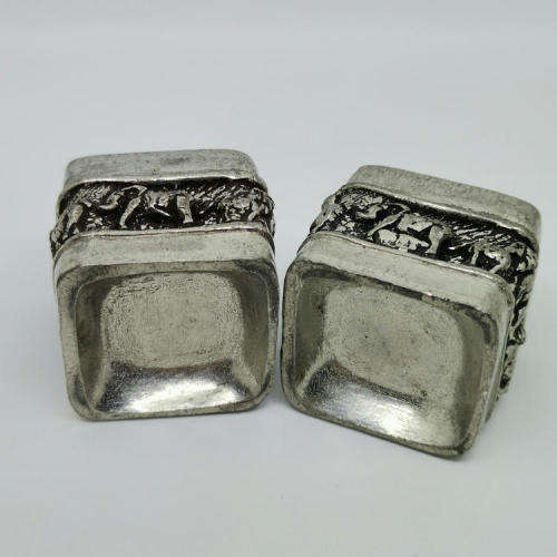 Pair of Andy C salt holders with spoons