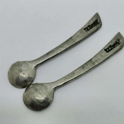 Pair of Andy C salt holders with spoons