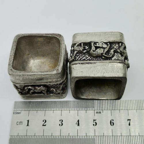 Pair of Andy C salt holders with spoons