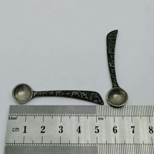 Pair of Andy C salt holders with spoons