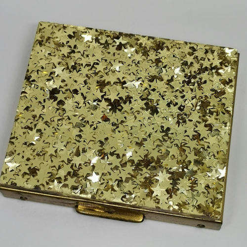 Mona Lisa powder box with hundreds of stars on lid - mirror inside
