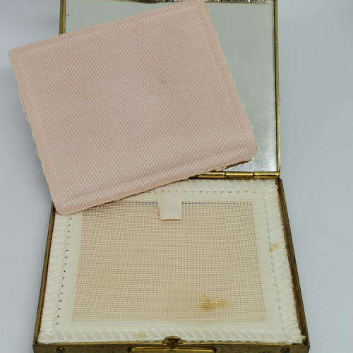 Mona Lisa powder box with hundreds of stars on lid - mirror inside