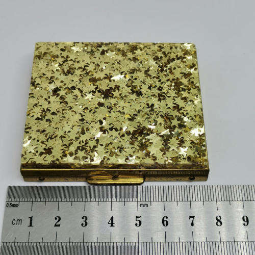 Mona Lisa powder box with hundreds of stars on lid - mirror inside