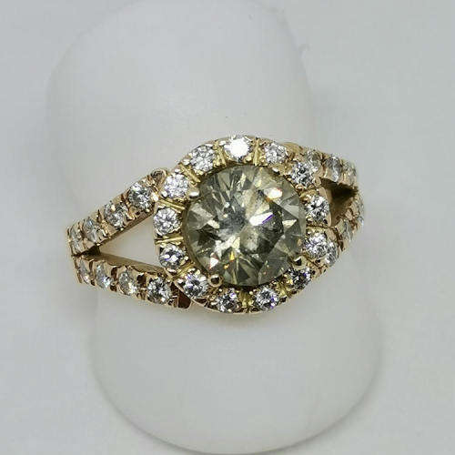 2,03ct Fancy Brown diamond ring with 29 smaller diamonds set in 9kt rose gold with E.G.L certificate