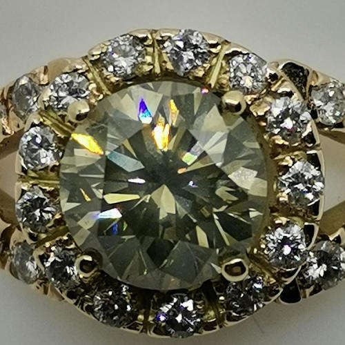 2,03ct Fancy Brown diamond ring with 29 smaller diamonds set in 9kt rose gold with E.G.L certificate