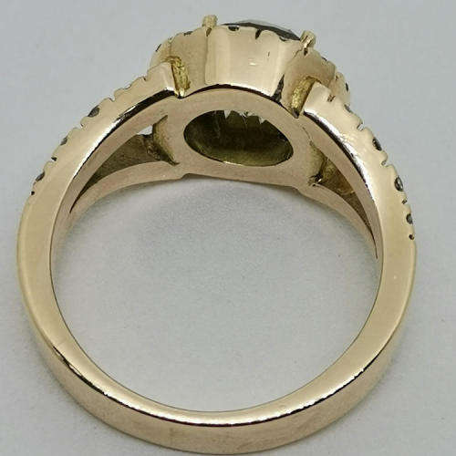 2,03ct Fancy Brown diamond ring with 29 smaller diamonds set in 9kt rose gold with E.G.L certificate