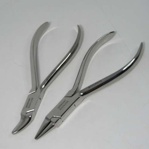 Lot of 6 Dentist stainless steel clamps and tools - unused