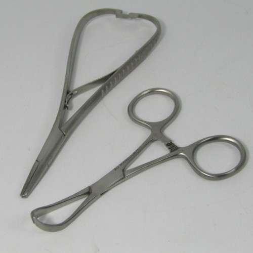 Lot of 6 Dentist stainless steel clamps and tools - unused
