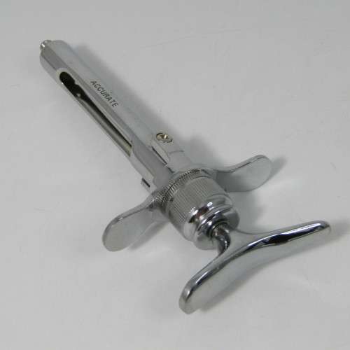 Lot of 7 stainless steel Dentist syringes and other tools