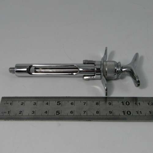 Lot of 7 stainless steel Dentist syringes and other tools