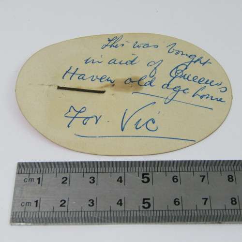 Pin sold in aid of Queens Haven old age home 1953 - with original card