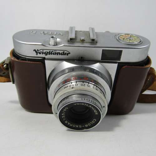 Voigtlanders VITO B in leather case and original box (1956) and books plus rangefinder