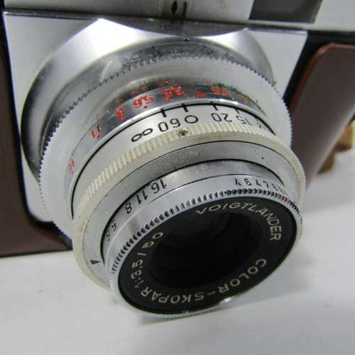 Voigtlanders VITO B in leather case and original box (1956) and books plus rangefinder