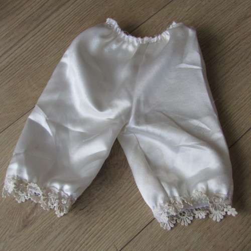 Lot of vintage doll clothing