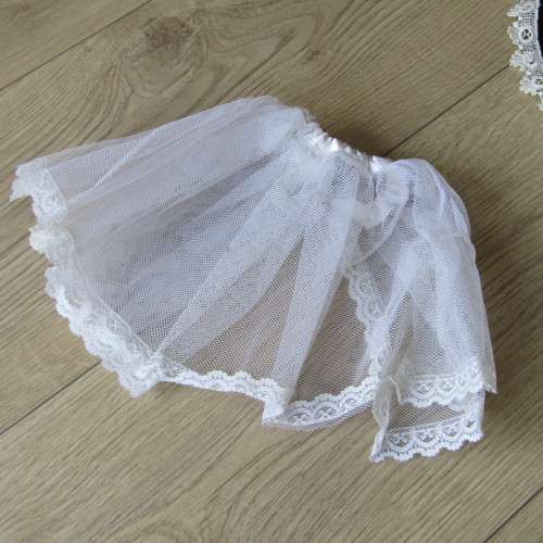 Lot of vintage doll clothing