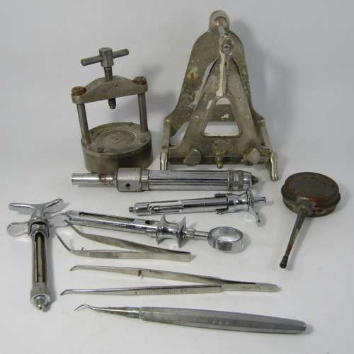 Vintage lot of dentist tools and syringes