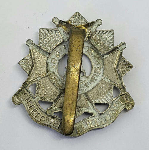 Royal Army Bedfordshire and Hertfordshire regiment cap badge with slide