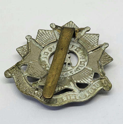 Royal Army Bedfordshire and Hertfordshire regiment cap badge with slide