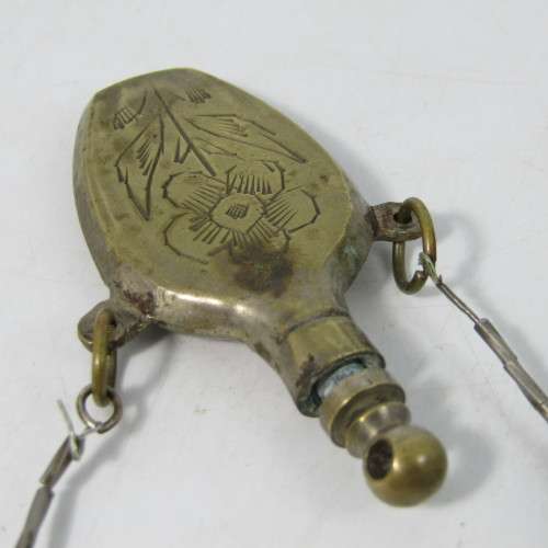 Antique brass perfume bottle on string necklace