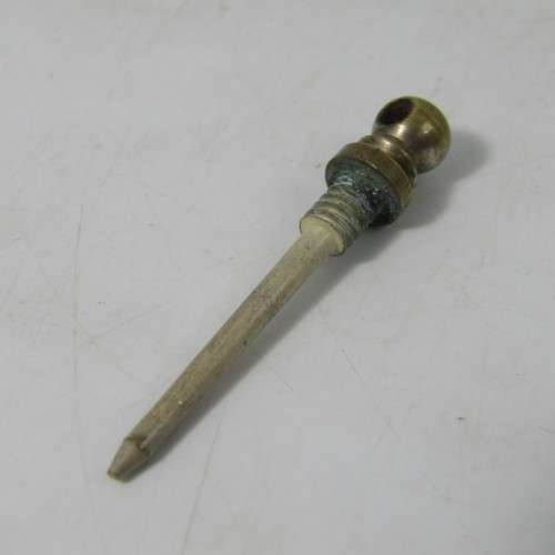 Antique brass perfume bottle on string necklace