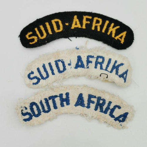 Lot of SA Navy badges and buttons