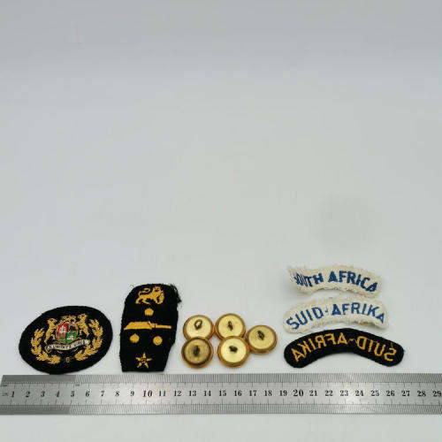 Lot of SA Navy badges and buttons
