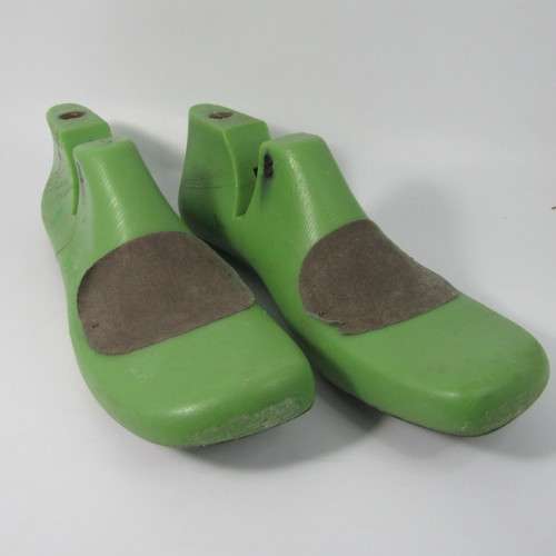 Pair of green plastic size 8 shoe forms