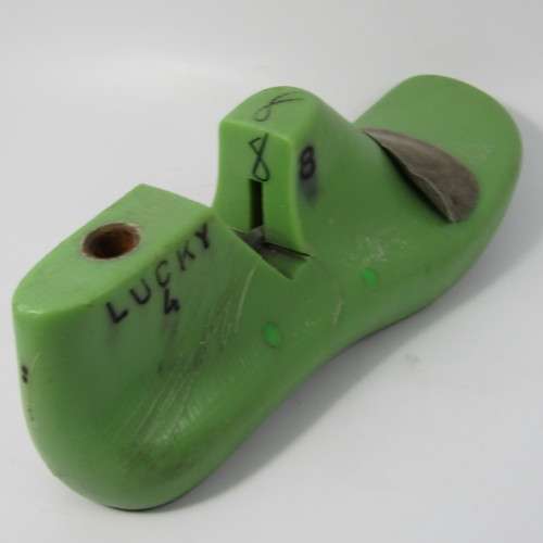 Pair of green plastic size 8 shoe forms