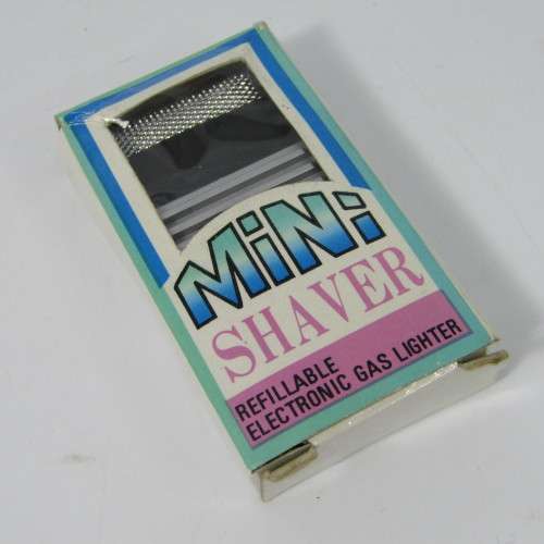 Vintage mini shaver electronic gas lighter in box - not working