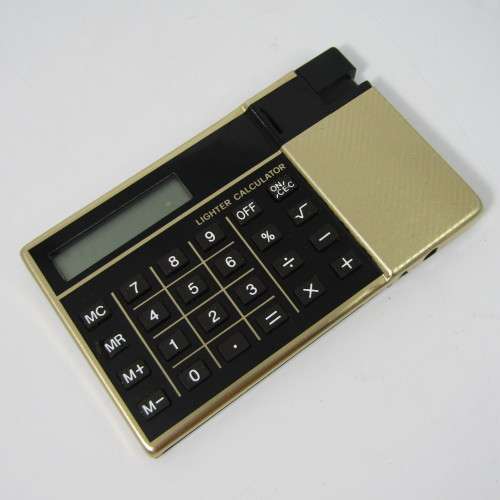 Vintage calculator lighter in box - not working