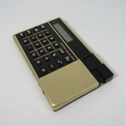 Vintage calculator lighter in box - not working