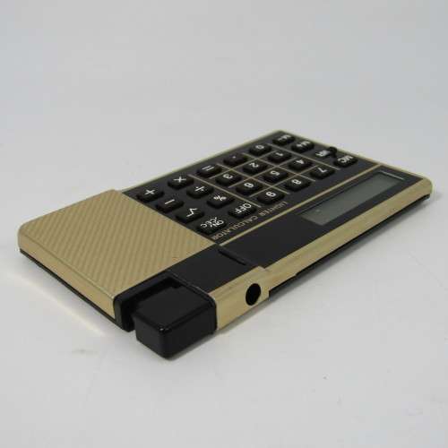 Vintage calculator lighter in box - not working
