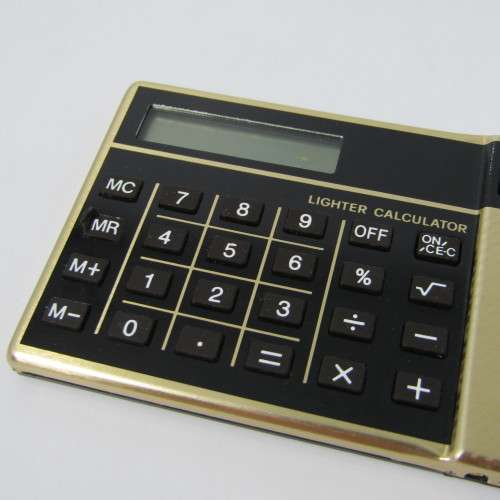 Vintage calculator lighter in box - not working