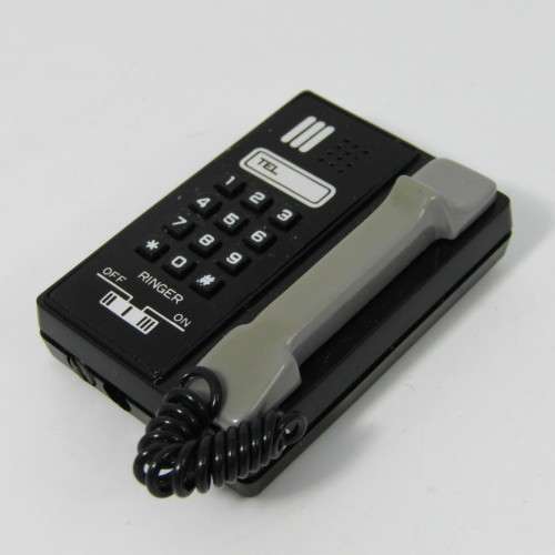 Vintage tele lite electronic telephone lighter in box - not working