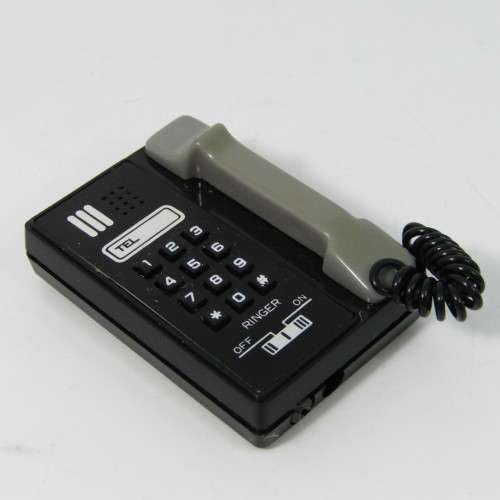 Vintage tele lite electronic telephone lighter in box - not working