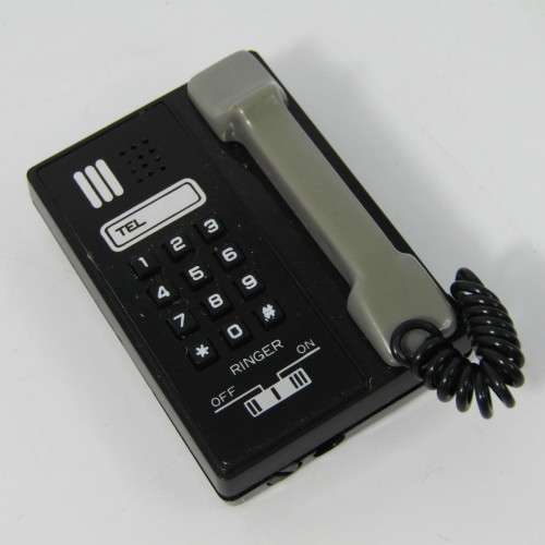 Vintage tele lite electronic telephone lighter in box - not working