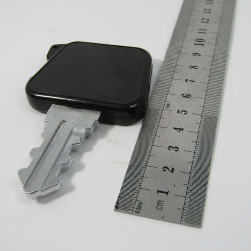 Vintage key shaped electric pocket lighter - not working