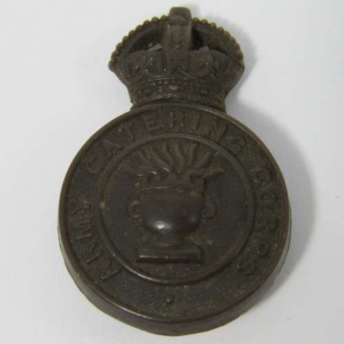 British Army Catering Corps bakelite badge with fold-over clips