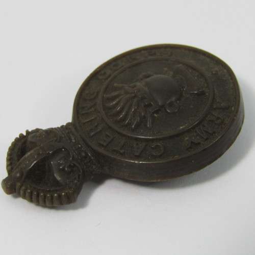 British Army Catering Corps bakelite badge with fold-over clips