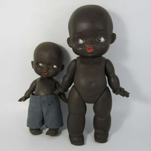 Pair of vintage African rubber dolls