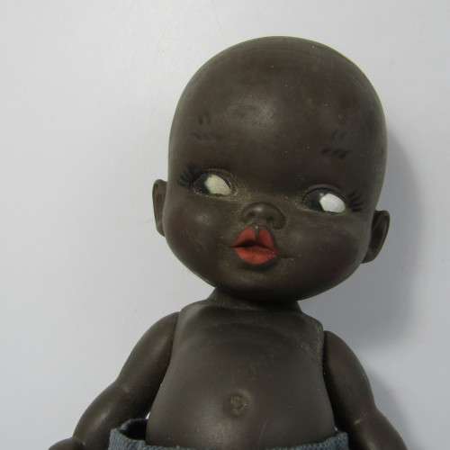 Pair of vintage African rubber dolls