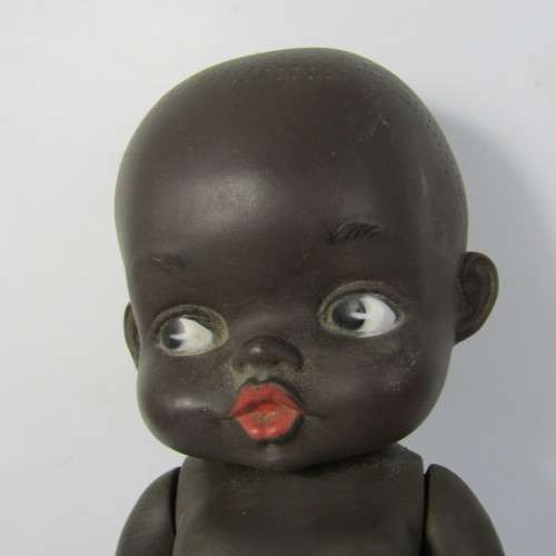 Pair of vintage African rubber dolls